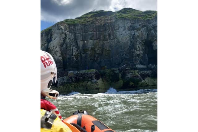 A paddle-boarder in distress was rescued today (July 2) by the Bridlington and Filey Coastguard Rescue Team with assistance from the Flamborough RNLI.