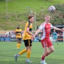 Boro's Harry Green in action v Rushall near one of the patched up areas on the Scarborough Sports Village surface. Photo by Richard Ponter