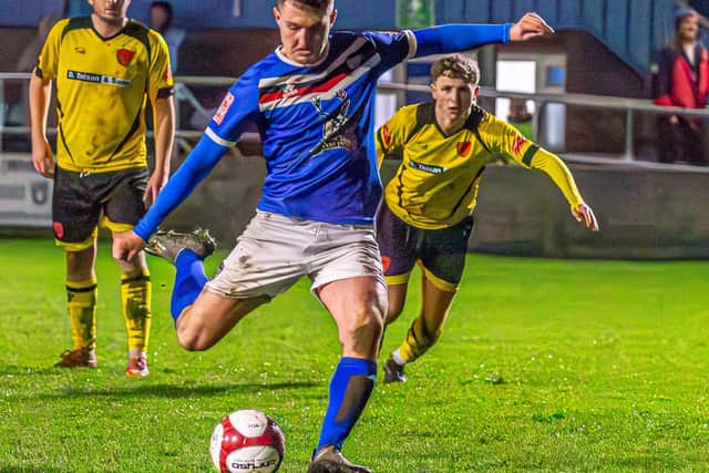 Jacob Gratton fires in the late spot-kick. PHOTOS BY BRIAN MURFIELD