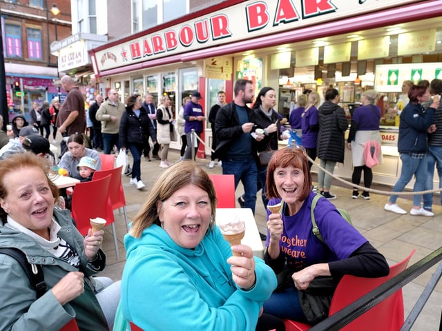 Walkers enjoy ice creams at the Harbour Bar, Scarborough.
picture: Richard Ponter