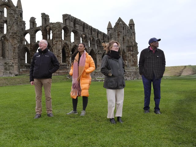The 'Game Changers' survey the art at Whitby Abbey.