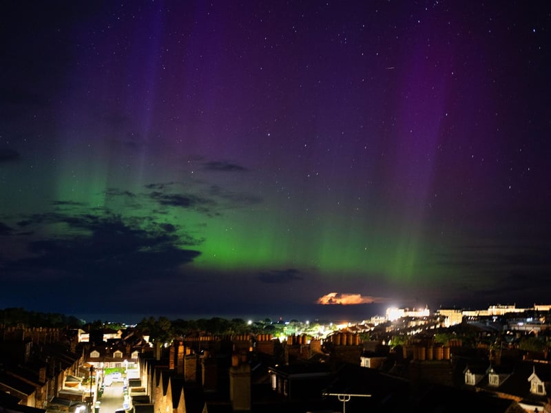 Scarborough with the beautiful Northern Lights display and lightning in the distance