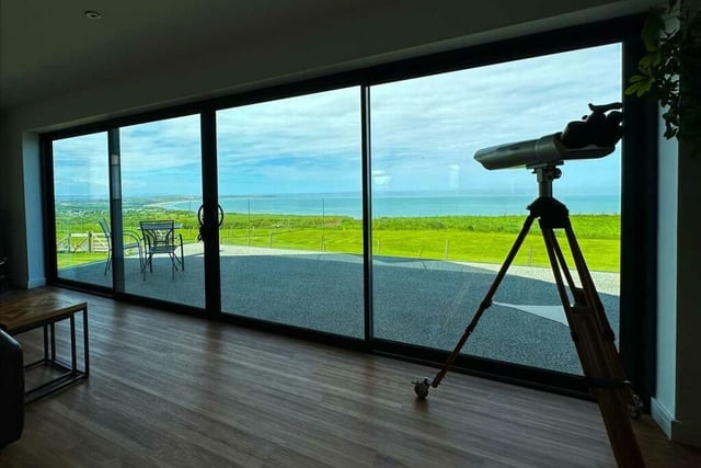 A wall of windows to showcase the stunning views.