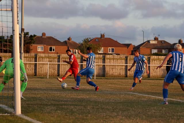 Ahmed Salam on the attack for Brid Town at Redcar Town. Photo by EC Media