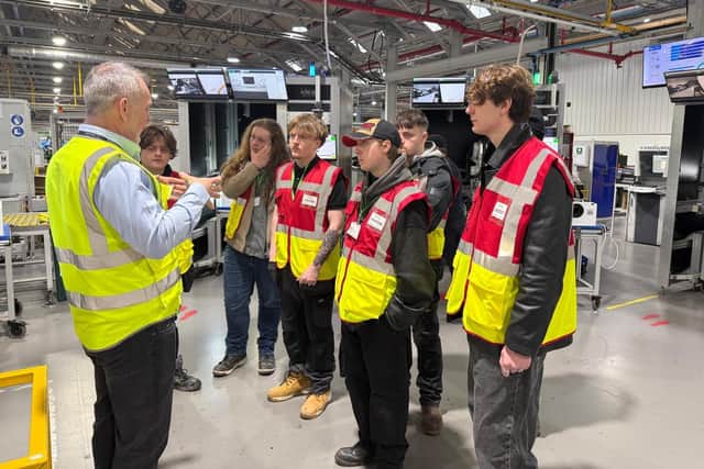 Production Director John Cook briefs the Scarborough TEC students in the main production hall at Ideal Heating’s headquarters site in Hull.
