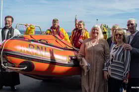 Family of Ernie Wellings with the Rev Matthew Pollard and Ernie Wellings.