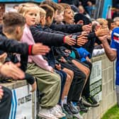 Whitby Town's Dan Rowe celebrates with the home fans after their FA Cup win against Morpeth Town. PHOTO BY BRIAN MURFIELD