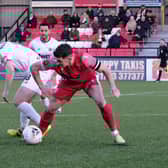 Boro skipper Michael Coulson battles for the ball against AFC Fylde PHOTOS BY RICHARD PONTER