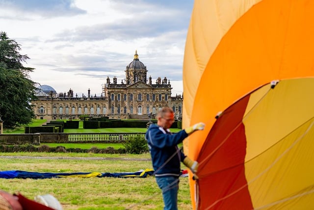 Setting up the balloons with Castle Howard looking on.