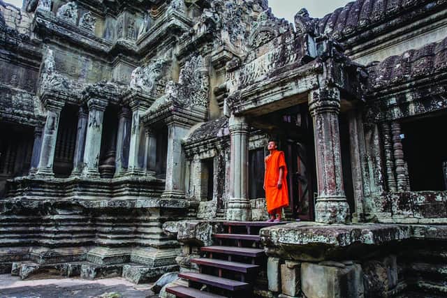 A monk at Angkor Wat temple. Image: AmaWaterways