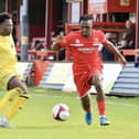 Bridlington Town, red kit, in action during their 1-0 home loss against Trafford FC in the FA Trophy. PHOTOS BY TCF PHOTOGRAPHY