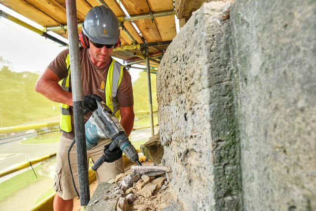 Jon Cocker, Lead Stonemason for Pinnacle Conservation at work on the exterior of Scarborough's Rotunda Museum. Image: ©Tony Bartholomew