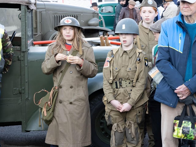 Visitors dressed in outfits from the wartime era
