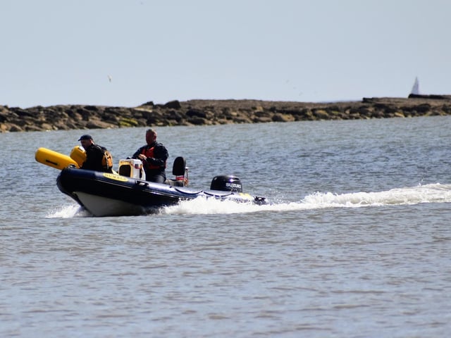 Enjoying a boat ride at Filey, by Heather Palmer.