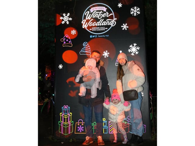 A happy family pictured at one of the many selfie stations found on the grounds.