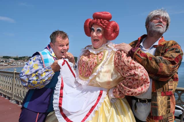 Daniel Dean as Loppy Louie, Mervyn Francis as Dame Polly Potts, and Paul Flanagan as Belle's father. Photo: Richard Ponter