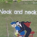 The Hawsker-cum-Stainsacre School Dracula-themed Neck and Neck land art welcomes Tour of Britain cyclists.
Taken from video footage by KWD Aerial Photography.