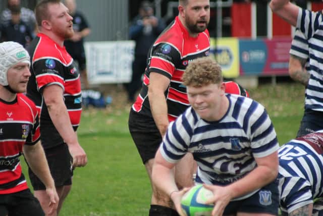 Will Husband bursts over for Pocklington's second try. PHOTOS BY PHIL GILBANK