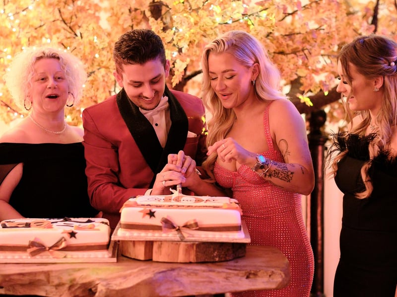 Chris and Chanelle Colebrooke cut the cake.