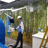 The UECC's new CT scanner still under protective covering.