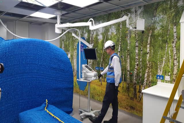 The UECC's new CT scanner still under protective covering.