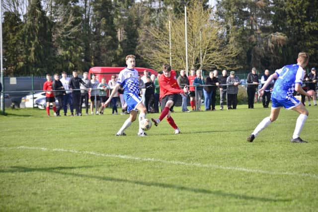 Jason Barnes scoring Town's second goal in the 2-0 defeat of visiting side Sculcoates in the HPL title crunch clash