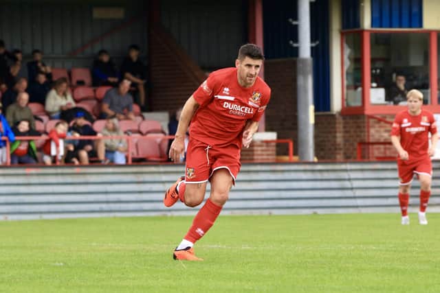 Brid Town assistant manager Michael Coulson in action PHOTOS BY TCF PHOTOGRAPHY