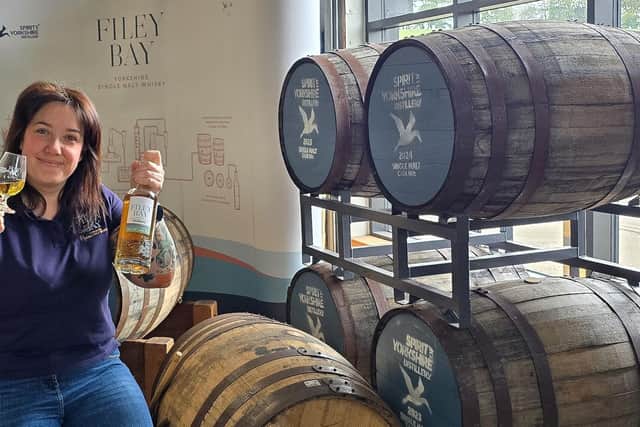1Filey Bay Brand Ambassador Amy Teasdale with the award-winning whisky