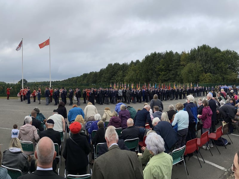 Crowds watching the military parade at Eden Camp.