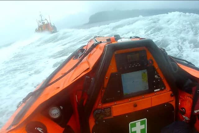 RNLI headcam image: RNLB Super-G crew enroute shortly after launching. Image: RNLI/Nick Gough.
