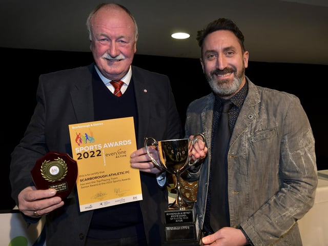 Scarborough Athletic chairman Trevor Bull and boss Jono Greening collect the trophies