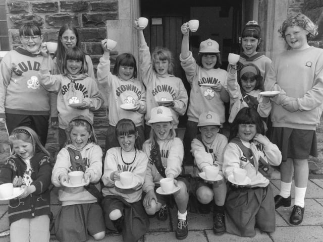 A coffee morning run by Filey Brownies with some help from a couple of Guides raised money for Christian Aid Week in May 1996.