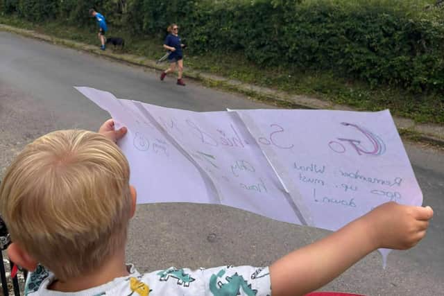 A youngster cheering on the Egton Cliff Challengers.