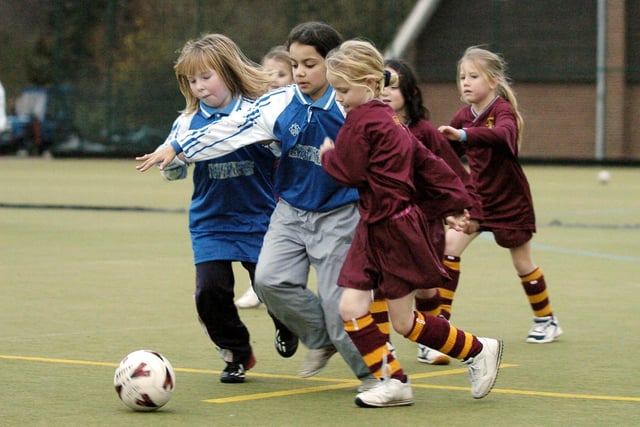Do you recognise anyone from this Gladstone Road A (blue.white kit) v Lisvane B game at this 2004 Scarborough Primary Schools girls football tournament, held at Scarborough College.