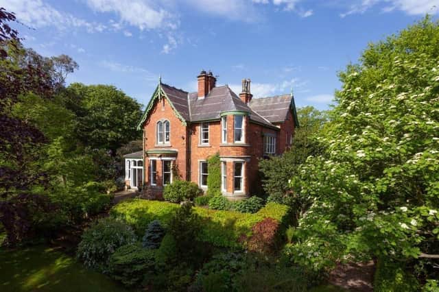 The grand 19th century six-bedroom property stands within 0.77 acres of grounds.