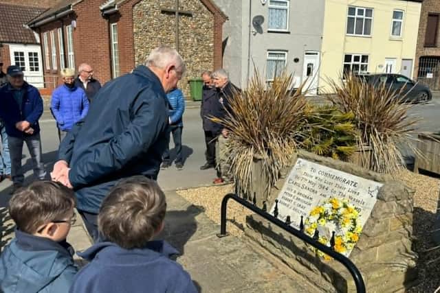 Councillor Vic Leppington lays a wreath on behalf of the parish council. Photos courtesy of Mark Smales