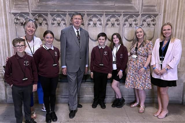 The four Martongate Primary School pupils are pictured with East Yorkshire MP Sir Greg Knight.