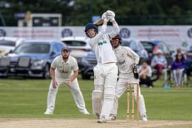 Joe Hall smashes another six as Woodhouse Grange 2nds beat Sutton-on-Hull to progress in the National Village Cup on Sunday. Photo by Mark Crabtree