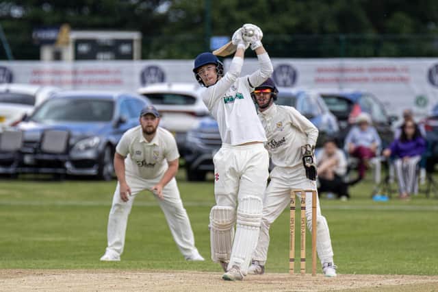 Joe Hall smashes another six as Woodhouse Grange 2nds beat Sutton-on-Hull to progress in the National Village Cup on Sunday. Photo by Mark Crabtree