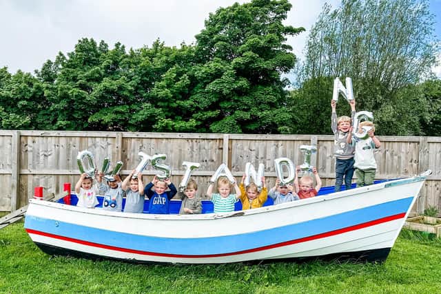 Youngsters at Roseville Childcare nursery in Lythe celebrate an 'outstanding' Ofsted report.