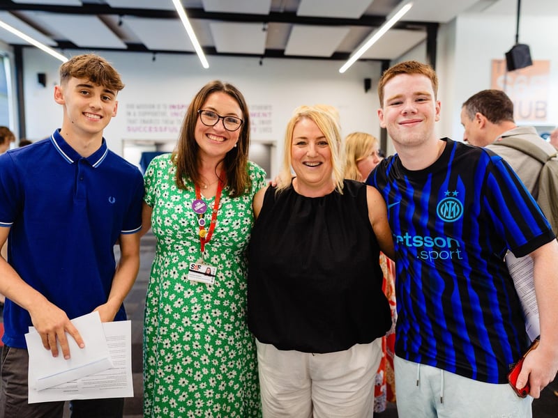 Proud staff with the students.