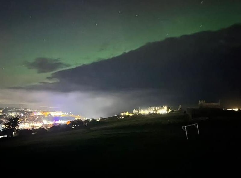 The green glow of the Northern Lights over Whitby Abbey and Green Lane, by Vikki Dowson.