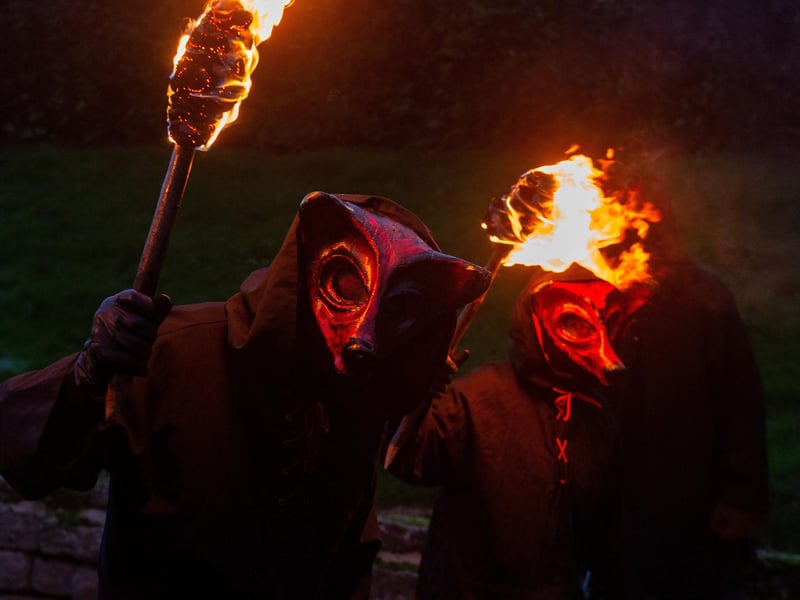 Fiery folk of the Krampus meet the Whitby spectators.