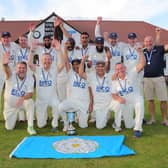 Luke Jarvis, front, second from left, celebrates the victory with his Yorkshire teammates.