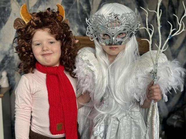 Hollie and Louie, eight and five years old, as Mr. Tumnus and the White Witch of Narnia.