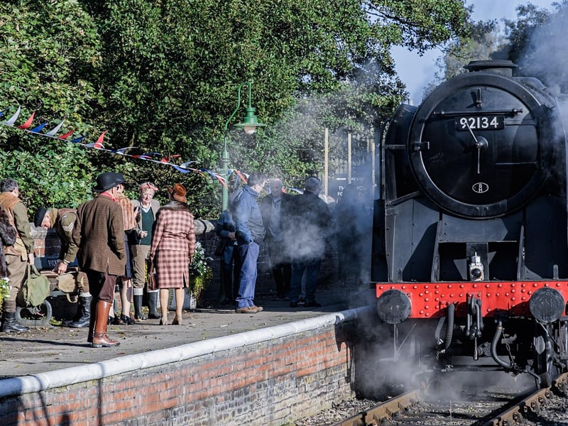 A steam train pulls up to let on some passengers.
picture: Tim Bruce
