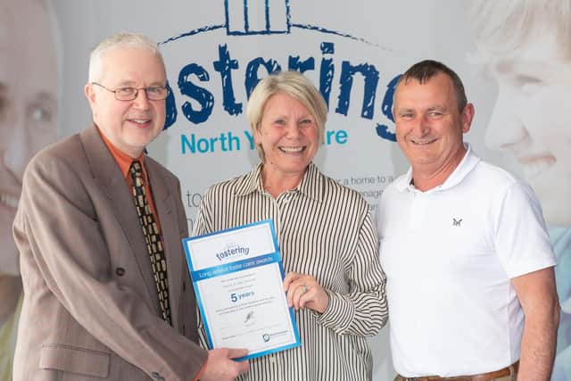 Foster carers John and Karen Pownall, from Whitby, have fostered for the past five years. They are pictured with North Yorkshire Council’s placement and fostering manager, Alan Tucker (left) during a conference last month where they were thanked for their years of fostering service.