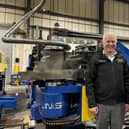 Unison Ltd’s joint managing directors, Alan Pickering and Julian Kidger, alongside an all-electric Unison Breeze 80 mm multi-stack tube bending machine.