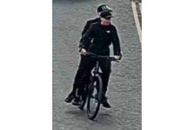 Police in Scarborough are asking for help to identify the two people on the bike.