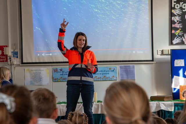 Phillipa Starmer, Area Manager, Shafts at the Woodsmith mine site, speaks to the children during assembly at Ruswarp School.